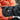 Close-up of the heat level button on a Heat Up Junior heated mitten